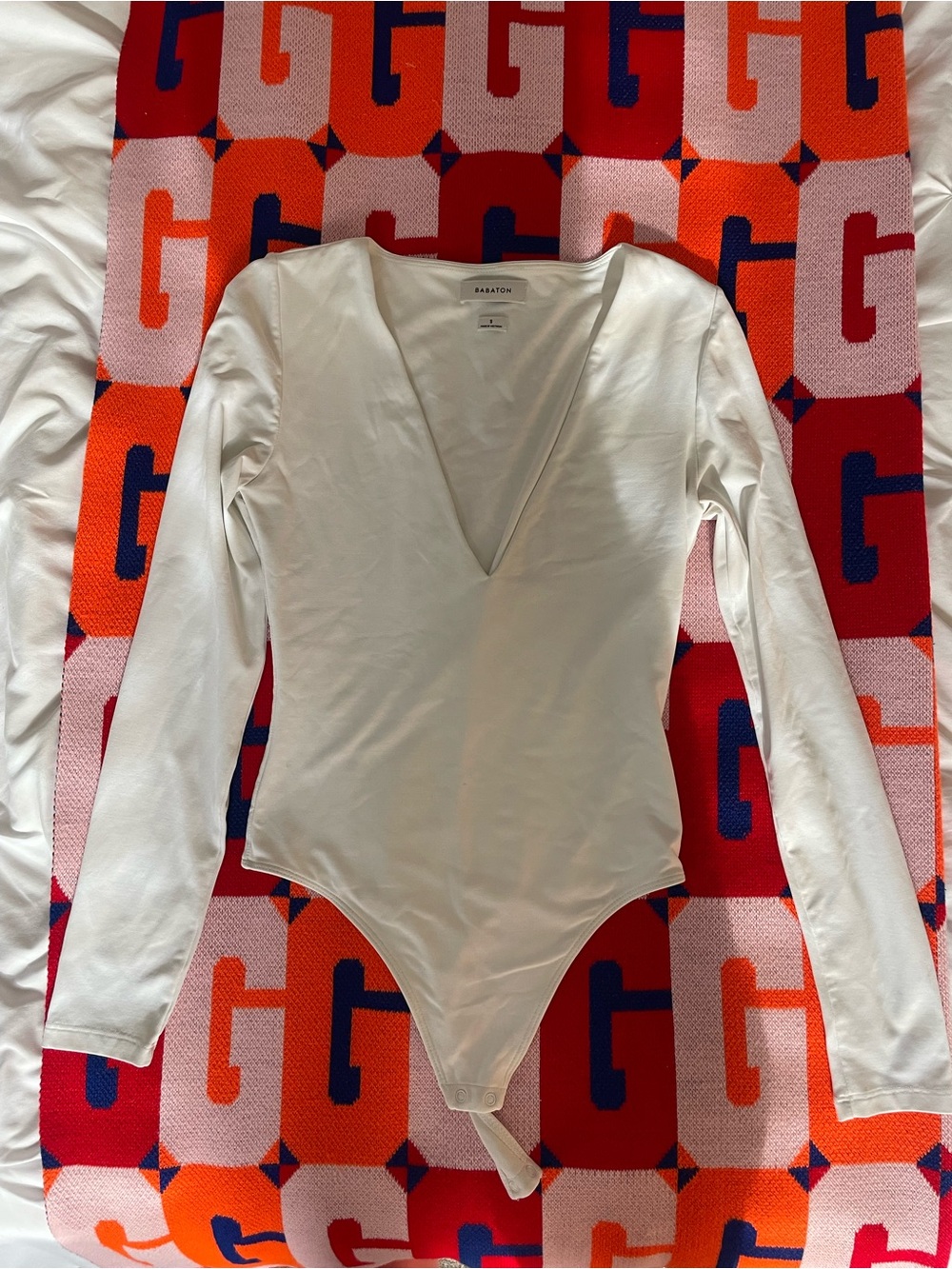 Babaton White Long-Sleeve V-Neck One-Piece Bodysuit